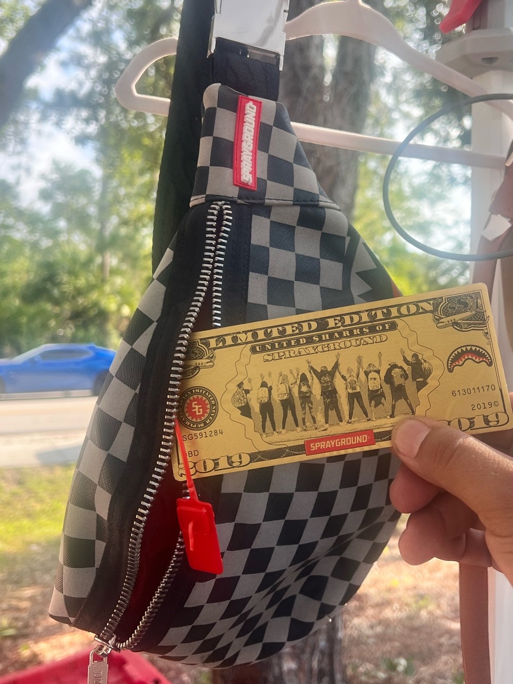 Sprayground Black & Gray Checkerboard Sling Bag with Red Accents